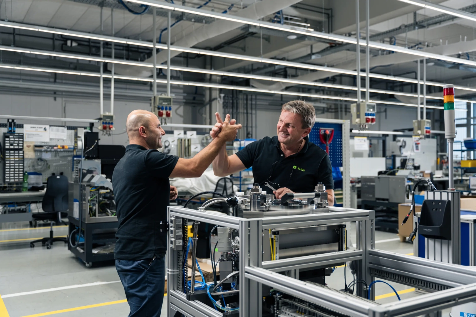 Proud Enigeers Working on Machine