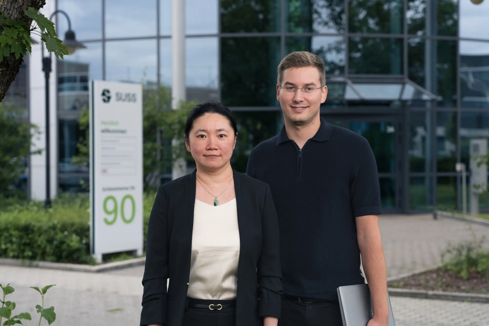 Business Employees in Front of Company