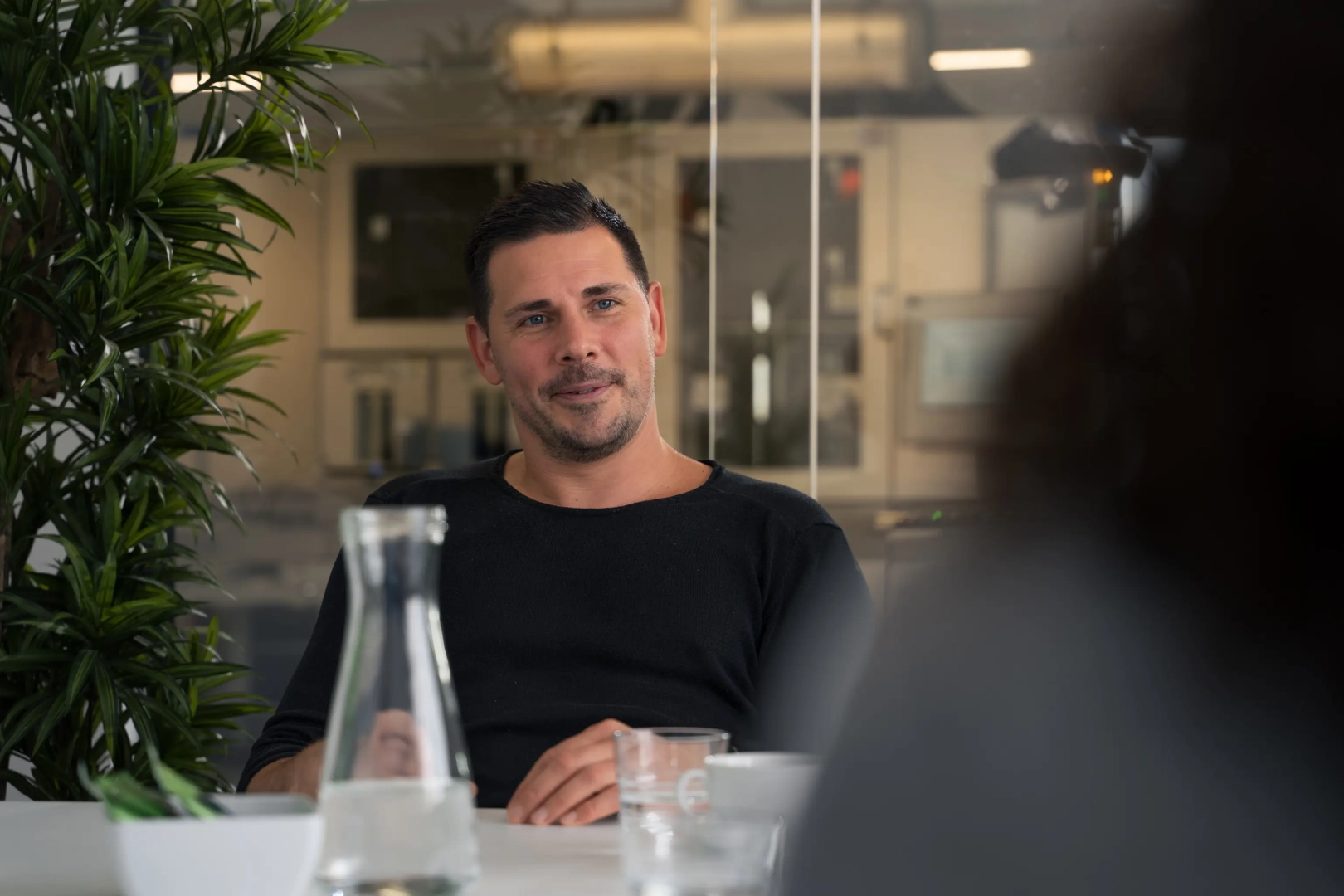 Man at Table in Job Interview