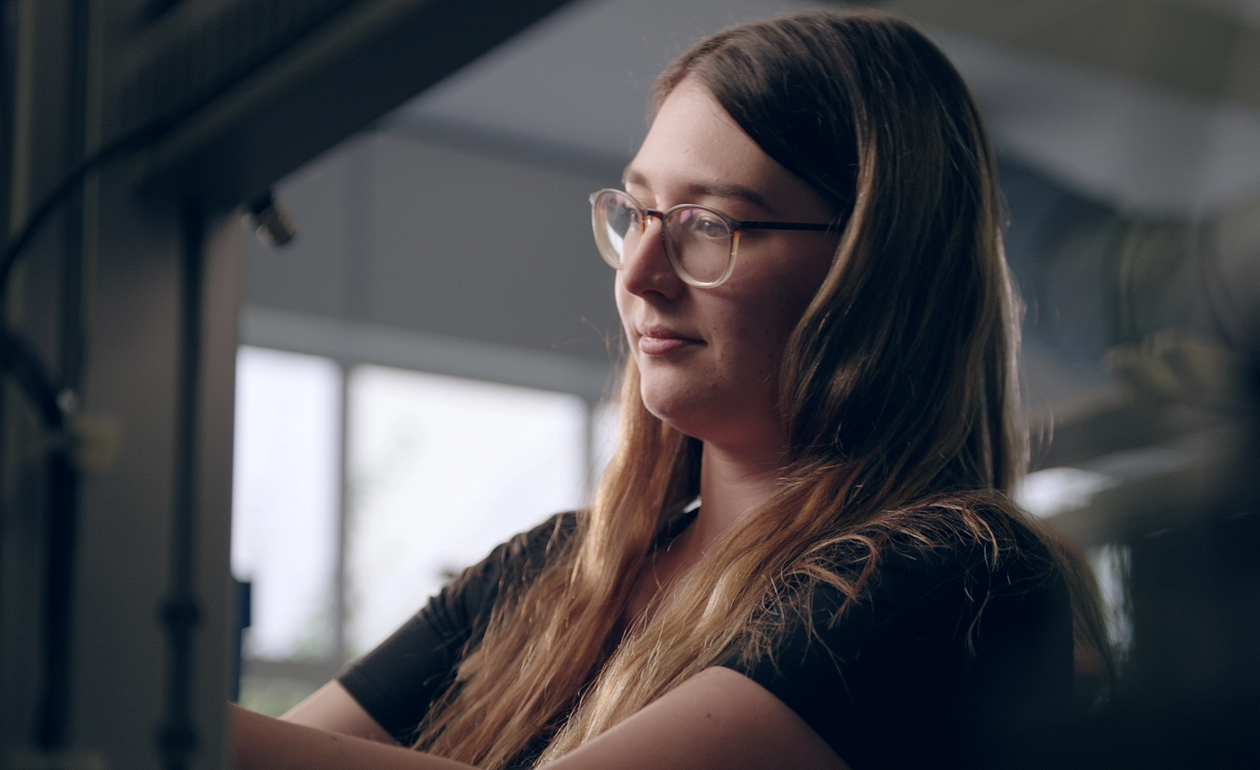 Young Woman Focused at Work