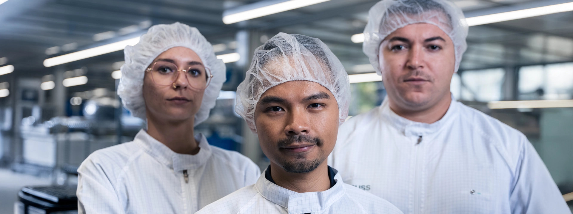 Three Seminconductor Experts in Production Hall
